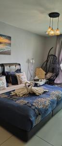 Postel nebo postele na pokoji v ubytování Ksl D'esplanade Studio Apartment's 1