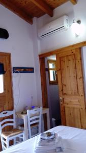Фотография из галереи zacharoularooms3 в городе Manganítis