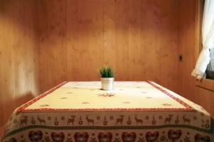 En eller flere senge i et værelse på International Camping Olympia