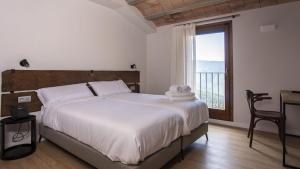 Postel nebo postele na pokoji v ubytování Abbatissa Hotel Restaurant