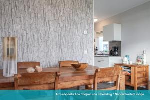 Una cocina o cocineta en Siblu camping Lauwersoog