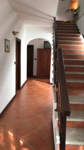 a hallway with stairs in a house at Agriturismo Genovesi in Alvignano