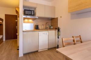 Η κουζίνα ή μικρή κουζίνα στο Studio cabine 86 Cosy