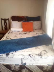 Posteľ alebo postele v izbe v ubytovaní Nafi guest house