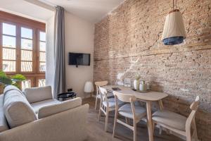 Posedenie v ubytovaní Apartamentos Líbere Málaga Teatro Romano