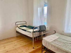 Voodi või voodid majutusasutuse Persati View toas