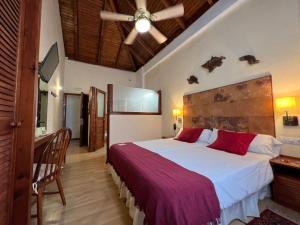 Postel nebo postele na pokoji v ubytování Gara Hotel