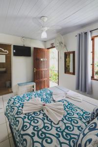 Cama ou camas em um quarto em Hostel Cabo Frio