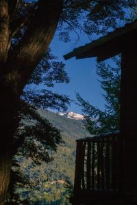 a view of a snow covered mountain in the distance at Espacio Aquarel Patagonia in Los Repollos