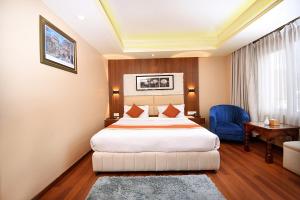 Letto o letti in una camera di Kumari Boutique Hotel