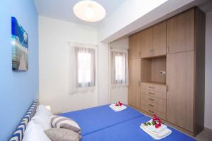 A bed or beds in a room at Villa Orsalia