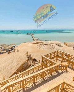 a view of a beach with the ocean in the background at Orange Bay in Hurghada