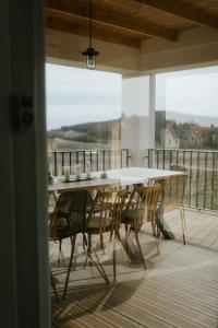 A balcony or terrace at Vass Villa Vendégház és Pincészet Felsőörs