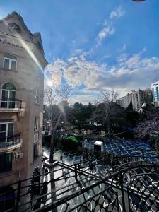 a view from a balcony of a building at Nizami Central Street Hotel in Baku