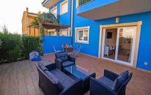 Część wypoczynkowa w obiekcie Planta baja con terraza chill out - Primera línea Tres Playas - ALBERT VILLAS