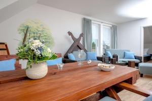 Coin salon dans l'établissement Ferienwohnung Hafen 2 autres photos