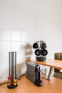 Кухня или мини-кухня в Studio Apart - Küche - Balkon - Netflix
