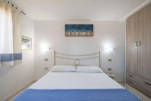 Katil atau katil-katil dalam bilik di Comfort a 4 minuti dal mare- Giardino e bbq
