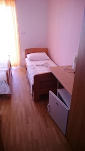 Postel nebo postele na pokoji v ubytování Guest House Lav