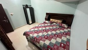 Voodi või voodid majutusasutuse Chandrika Residency toas