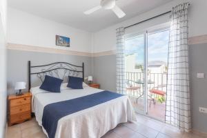 Postel nebo postele na pokoji v ubytování Apartamentos Mundaka Albir
