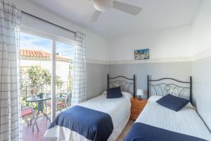 Postel nebo postele na pokoji v ubytování Apartamentos Mundaka Albir