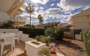 En balkon eller terrasse på Casa privada en primera línea - Tres Playas ALBERT VILLAS