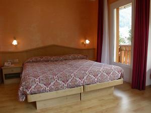 Кровать или кровати в номере Hotel Bellaria