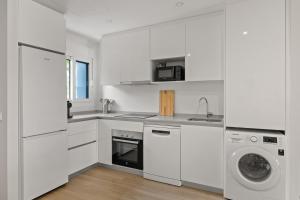 Kuchyňa alebo kuchynka v ubytovaní W4 Private Pool - Luxury Style Apartment
