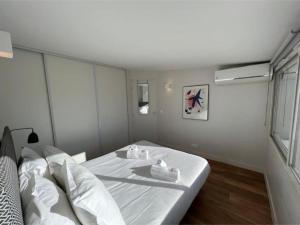 Postel nebo postele na pokoji v ubytování Beautiful 2 bedrooms in Cannes