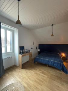 Postel nebo postele na pokoji v ubytování L’ATYPIK