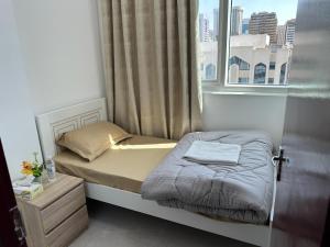 Кровать или кровати в номере Corniche Street - Stunning Room