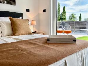 Postel nebo postele na pokoji v ubytování Apartments E&T by Locap Group