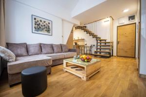 Χώρος καθιστικού στο Apartmani RAZVIGORA - DivčiNova