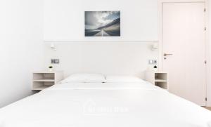 เตียงในห้องที่ MyHouseSpain - Salustio Apartments