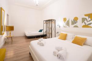 Кровать или кровати в номере Vatican Apartment Santamaura