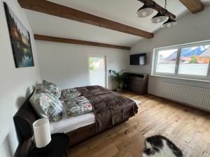 Televízia a/alebo spoločenská miestnosť v ubytovaní Cityapartments Reutte