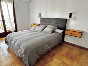 Posteľ alebo postele v izbe v ubytovaní Melis Mar - Apartamento con vistas en Pals