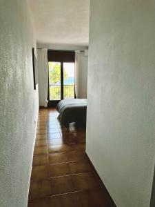 Posteľ alebo postele v izbe v ubytovaní Melis Mar - Apartamento con vistas en Pals