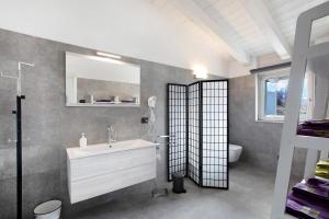 Koupelna v ubytování Residence soleluna - Loft Sirio + 21 fotografií