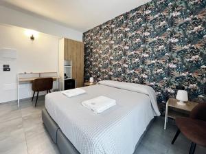 Кровать или кровати в номере Pinea b&b