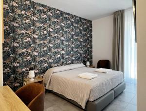 Кровать или кровати в номере Pinea b&b