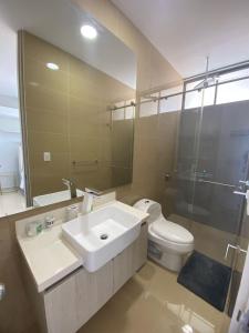 a bathroom with a sink and a toilet and a shower at Apartamento Santa Marta Samaria - 3beds, 4baths, Playa Privada, Cabo Tortuga in Santa Marta