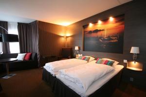 Postel nebo postele na pokoji v ubytování Thon PartnerHotel Skagen + 20 fotografií