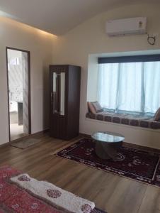 Giường trong phòng chung tại Thar Olive Cottages Pilani