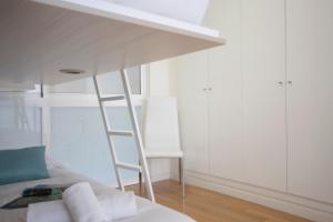 Postel nebo postele na pokoji v ubytování SingularStays Comedias IV