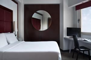 Letto o letti in una camera di Lato Boutique Hotel