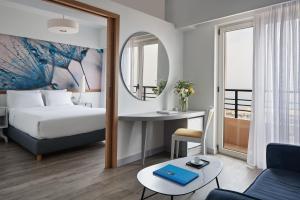 Letto o letti in una camera di Lato Boutique Hotel