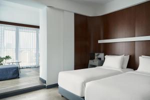 Letto o letti in una camera di Lato Boutique Hotel
