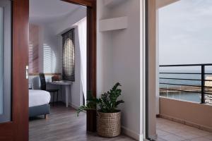 Letto o letti in una camera di Lato Boutique Hotel